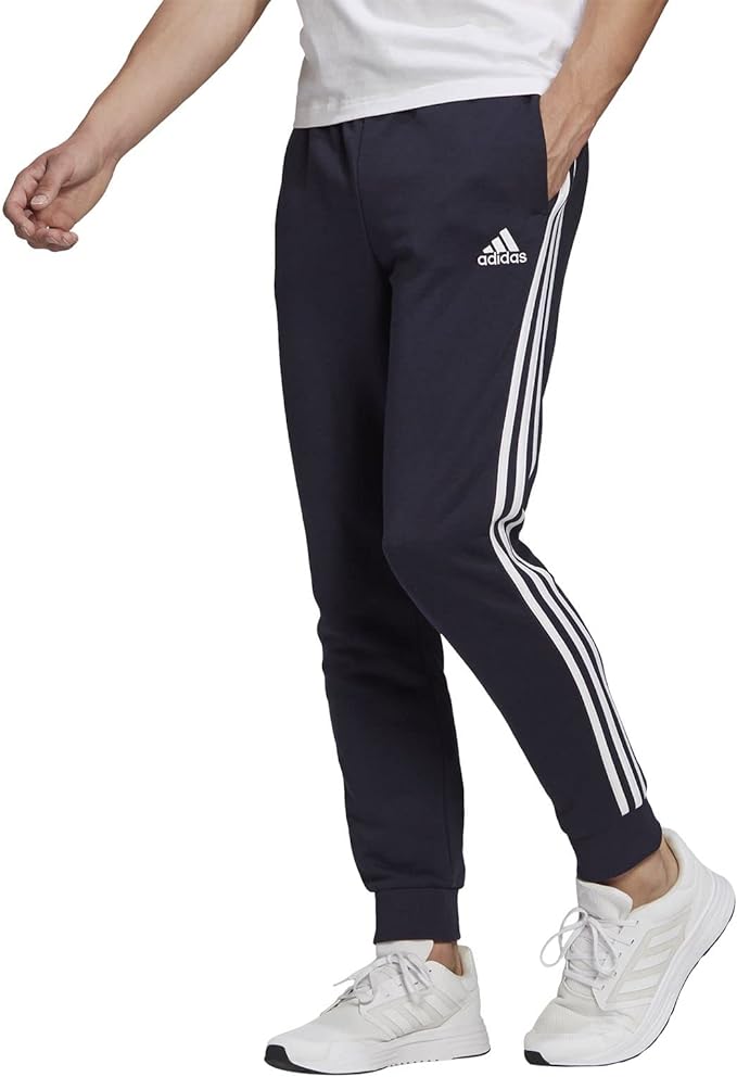 adidas pantaloni essentials french terry tapered cuff 3-stripes blu uomo